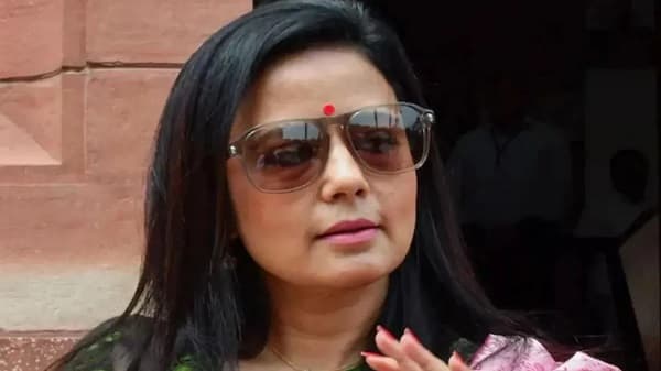A crowd of women holding eggs and tomatoes has gathered at the court premises; is Mahua the target?