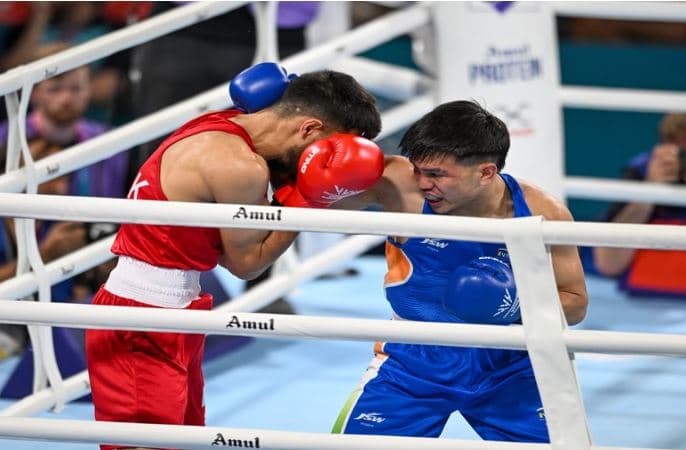 Commonwealth Games 2026: Jadumani Singh reaches quarter-finals after defeating Pakistani boxer.