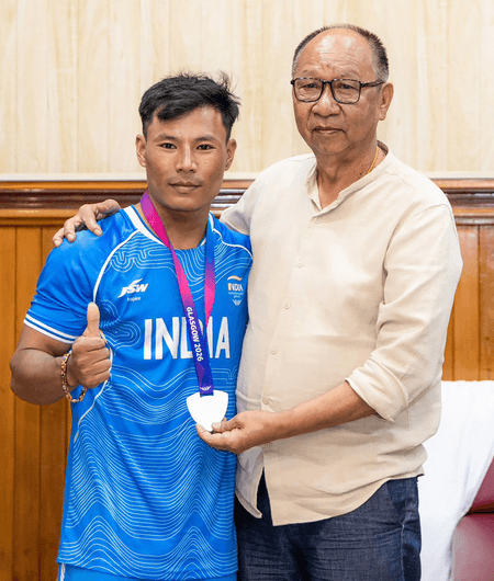 Manipur CM felicitates Commonwealth Games silver medallist Rishikanta Singh