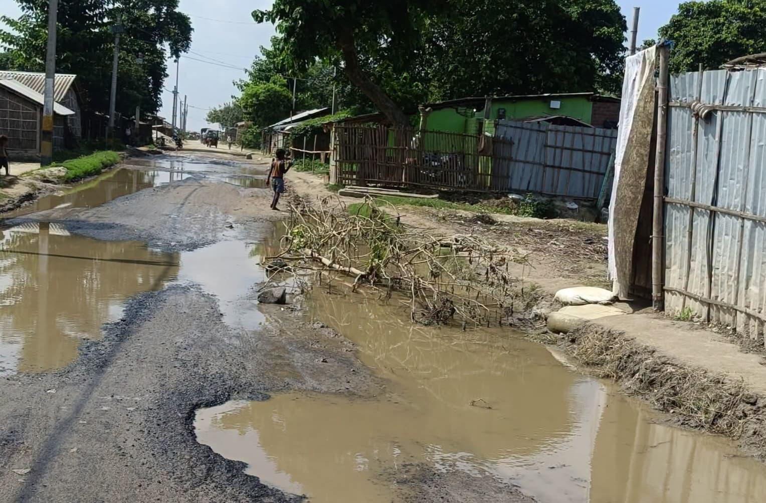 The Navgachia-Tintanga Jahaz Ghat Road mocks claims of development; the road has turned into a stretch of potholes.