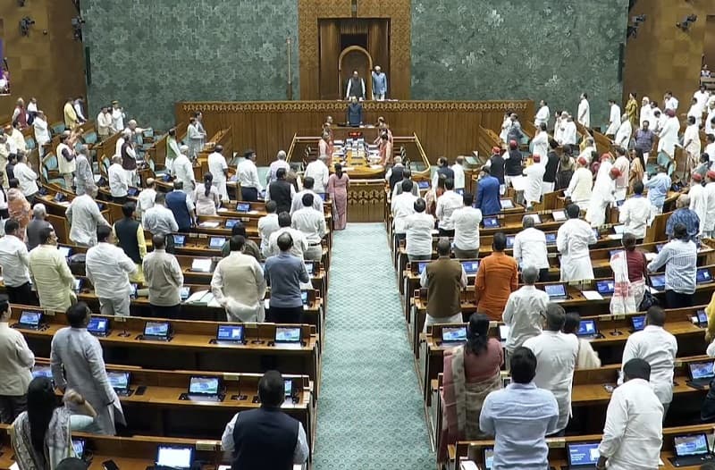 Uproar by the opposition; proceedings of the Lok Sabha and Rajya Sabha adjourned until 2 PM.