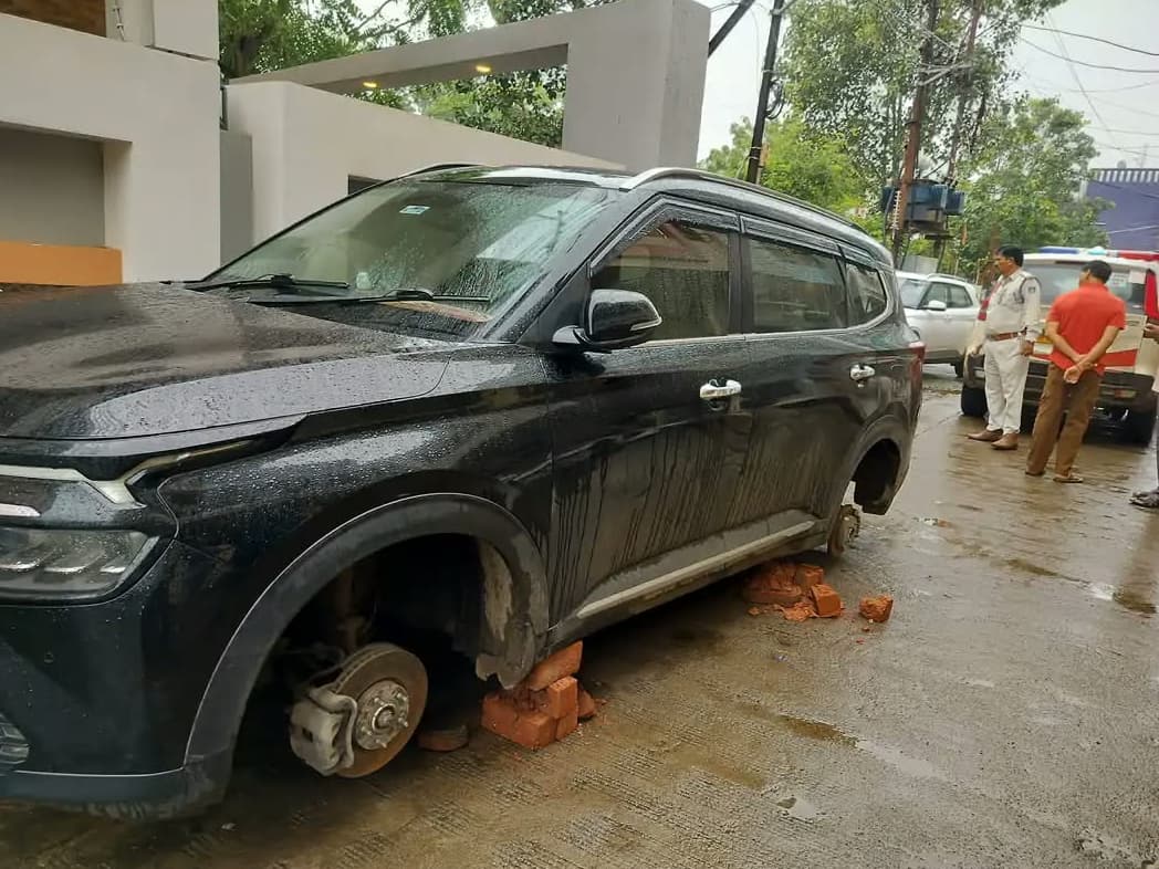 Two Wheels Of A Car Parked In