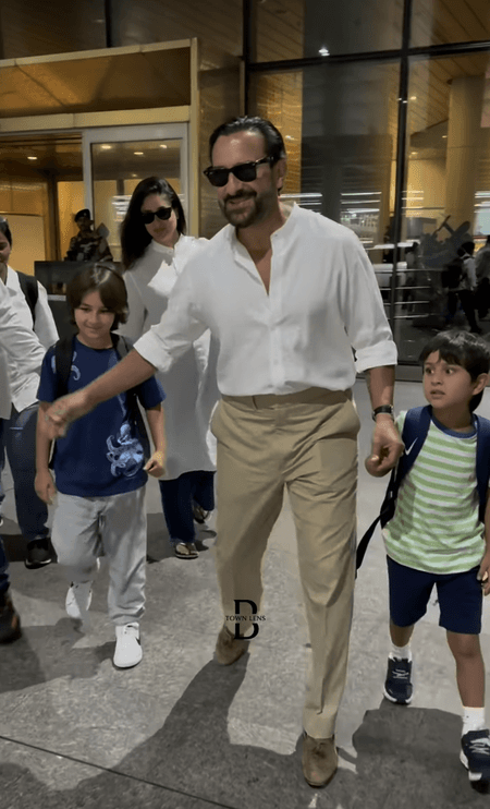 Taimur Ali Khan greets staff, Jeh looks puzzled as they arrive from Europe trip with Kareena Kapoor & Saif Ali Khan