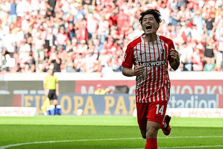 Suzuki hat-trick fires Freiburg to opening victory in Germany